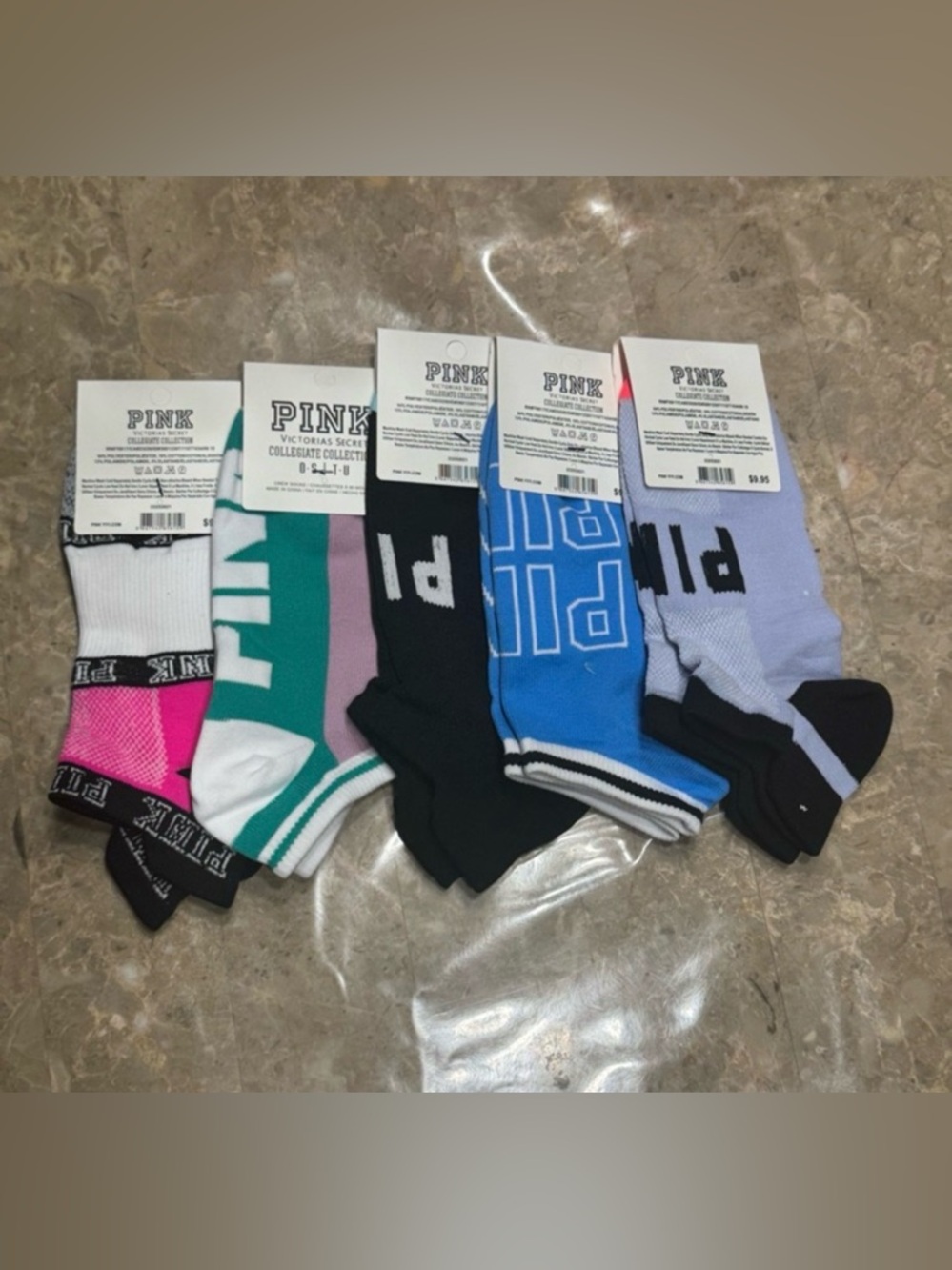 New Pink Victoria’s Secret Socks
With tags 
New Pink socks 
5 pairs included